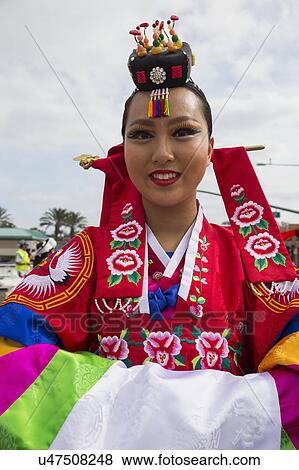 Orange County, City of Westminster, Southern California, USA, February 21, 2015, Little Saigon, Vietnamese-American Community, TET Parade celebrates Tet Lunar New Year, closeup woman View Large Photo Image Stock Photo - Orange County, City of Westminster, Southern California, USA, February 21, 2015, Little Saigon, Vietnamese-American Community, TET Parade celebrates Tet Lunar New Year, closeup woman. Fotosearch