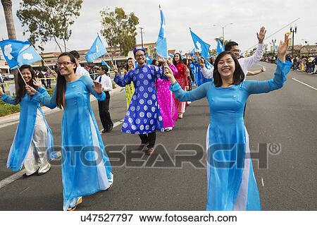 Stock Photo - Orange County, City of Westminster, Southern California, USA, February 21, 2015, Little Saigon, Vietnamese-American Community, TET Parade celebrates Tet Lunar New Year, women march in parade. Fotosearch