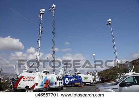 Stock Image - REAGAN PRESIDENTIAL LIBRARY, SIMI VALLEY, LA, CA - SEPTEMBER 16, 2015, satellite dishes and TV broadcast vans for Republican Presidential Debate. . Fotosearch