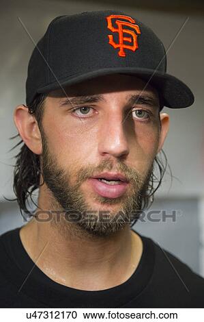Stock Image - San Francisco, California, USA, October 16, 2014, AT&T Park, baseball stadium, SF Giants versus St. Louis Cardinals, National League Championship Series (NLCS), pitcher Brent Musburger, Series MVP, dugout celebration. Fotosearch