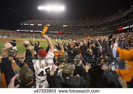 Stock Image - San Francisco, California, USA, October 16, 2014, AT&T Park, baseball stadium, SF Giants versus St. Louis Cardinals, National League Championship Series (NLCS), excited crowd Giants win 2014 NL Pennant. Fotosearch