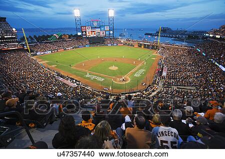 Stock Image - San Francisco, California, USA, October 16, 2014, AT&T Park, baseball stadium, SF Giants versus St. Louis Cardinals, National League Championship Series (NLCS), crowd watches game elevated view. Fotosearch
