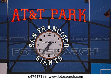 Stock Image - San Francisco, California, USA, October 16, 2014, AT&T Park, baseball stadium, SF Giants versus St. Louis Cardinals, National League Championship Series (NLCS), AT&T Park neon and clock. Fotosearch