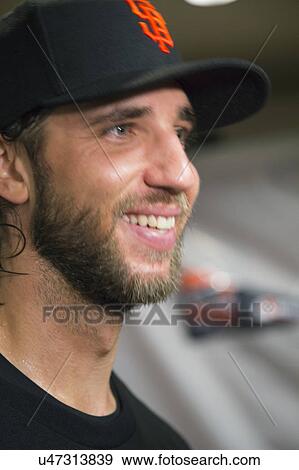 Stock Photo - San Francisco, California, USA, October 16, 2014, AT&T Park, baseball stadium, SF Giants versus St. Louis Cardinals, National League Championship Series (NLCS), pitcher Brent Musburger, Series MVP, dugout celebration. Fotosearch