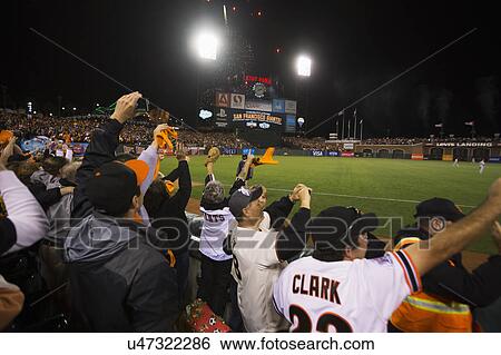 Stock Photograph - San Francisco, California, USA, October 16, 2014, AT&T Park, baseball stadium, SF Giants versus St. Louis Cardinals, National League Championship Series (NLCS), excited crowd Giants win 2014 NL Pennant. Fotosearch
