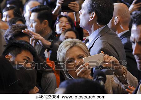 Picture - SAN GABRIEL, LA, CA - JANUARY 7, 2016, Democratic Presidential candidate Hillary Clinton shakes hands and poses for pictures at the Asian American and Pacific Islander (AAPI) members.. Fotosearch