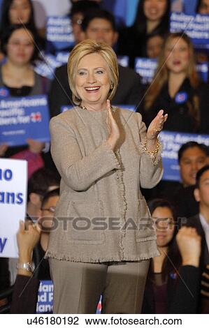 Stock Image - SAN GABRIEL, LA, CA - JANUARY 7, 2016, Democratic Presidential candidate Hillary Clinton smiles and claps to Asian American and Pacific Islander (AAPI) members.. Fotosearch