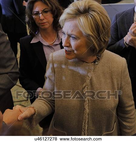 Stock Photo - SAN GABRIEL, LA, CA - JANUARY 7, 2016, Democratic Presidential candidate Hillary Clinton shakes hands and poses for pictures at the Asian American and Pacific Islander (AAPI) members.. Fotosearch