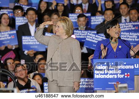 SAN GABRIEL, LA, CA - JANUARY 7, 2016, Democratic Presidential candidate Hillary Clinton stairs at crowd at Asian American and Pacific Islander (AAPI) members, while Democrat Representative Judy Chu speaks at podium. View Large Photo Image Stock Photo - SAN GABRIEL, LA, CA - JANUARY 7, 2016, Democratic Presidential candidate Hillary Clinton stairs at crowd at Asian American and Pacific Islander (AAPI) members, while Democrat Representative Judy Chu speaks at podium.. Fotosearch