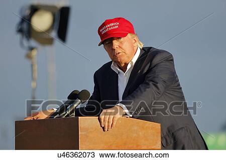 SAN PEDRO, CA - SEPTEMBER 15, 2015: Donald Trump, 2016 Republican presidential candidate, speaks during a rally aboard the Battleship USS Iowa in San Pedro, Los Angeles, California while wearing a red baseball hat that says campaign slogan "Make... View Large Photo Image Stock Image - SAN PEDRO, CA - SEPTEMBER 15, 2015: Donald Trump, 2016 Republican presidential candidate, speaks during a rally aboard the Battleship USS Iowa in San Pedro, Los Angeles, California while wearing a red baseball hat that says campaign slogan "Make.... Fotosearch