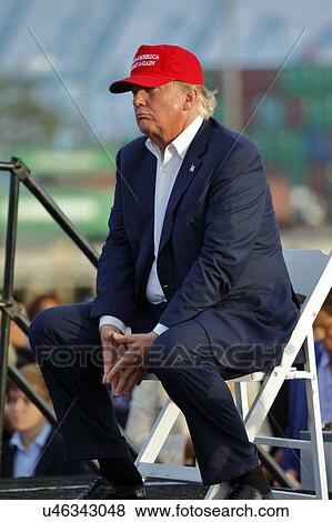 SAN PEDRO, CA - SEPTEMBER 15, 2015: Donald Trump, 2016 Republican presidential candidate, speaks during a rally aboard the Battleship USS Iowa in San Pedro, Los Angeles, California while wearing a red baseball hat that says campaign slogan "Make... View Large Photo Image Stock Photo - SAN PEDRO, CA - SEPTEMBER 15, 2015: Donald Trump, 2016 Republican presidential candidate, speaks during a rally aboard the Battleship USS Iowa in San Pedro, Los Angeles, California while wearing a red baseball hat that says campaign slogan "Make.... Fotosearch