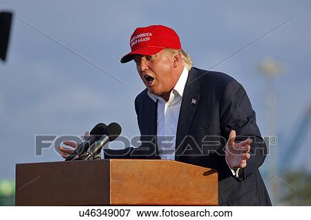 SAN PEDRO, CA - SEPTEMBER 15, 2015: Donald Trump, 2016 Republican presidential candidate, speaks during a rally aboard the Battleship USS Iowa in San Pedro, Los Angeles, California while wearing a red baseball hat that says campaign slogan "Make... View Large Photo Image Stock Photo - SAN PEDRO, CA - SEPTEMBER 15, 2015: Donald Trump, 2016 Republican presidential candidate, speaks during a rally aboard the Battleship USS Iowa in San Pedro, Los Angeles, California while wearing a red baseball hat that says campaign slogan "Make.... Fotosearch