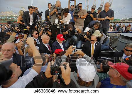 SAN PEDRO, CA - SEPTEMBER 15, 2015: Donald Trump, 2016 Republican presidential candidate, signs autographs at rally aboard the Battleship USS Iowa in San Pedro, Los Angeles, California View Large Photo Image Stock Photograph - SAN PEDRO, CA - SEPTEMBER 15, 2015: Donald Trump, 2016 Republican presidential candidate, signs autographs at rally aboard the Battleship USS Iowa in San Pedro, Los Angeles, California. Fotosearch