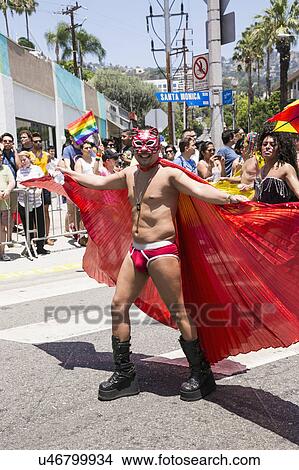 West Hollywood, Los Angeles, California, USA, June 14, 2015, 40th annual Gay Pride Parade for LGBT Community, down Santa Monica Blvd., man in red cape and mask poses View Large Photo Image Picture - West Hollywood, Los Angeles, California, USA, June 14, 2015, 40th annual Gay Pride Parade for LGBT Community, down Santa Monica Blvd., man in red cape and mask poses. Fotosearch