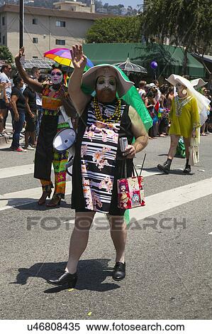 Stock Photography - West Hollywood, Los Angeles, California, USA, June 14, 2015, 40th annual Gay Pride Parade for LGBT Community, down Santa Monica Blvd., gay men dressed in skirts. Fotosearch