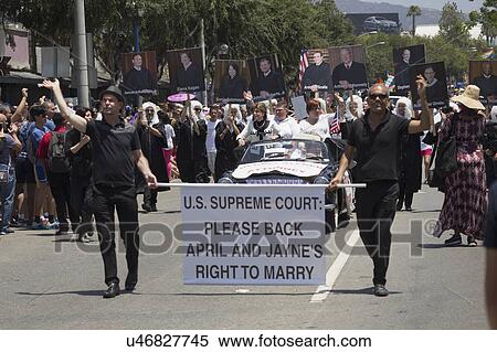 Stock Photography - West Hollywood, Los Angeles, California, USA, June 14, 2015, 40th annual Gay Pride Parade for LGBT Community, down Santa Monica Blvd., attorney Gloria Allred with Supreme Court Justices on posters. Fotosearch