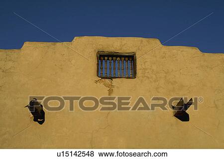 Adobe structure with protruding vigas View Large Photo Image Stock Photo - Adobe structure with protruding vigas. Fotosearch