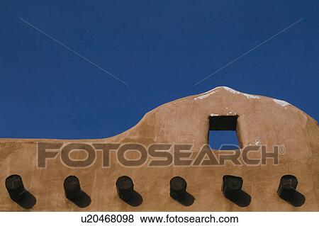 Adobe structure with protruding vigas View Large Photo Image Stock Photo - Adobe structure with protruding vigas. Fotosearch