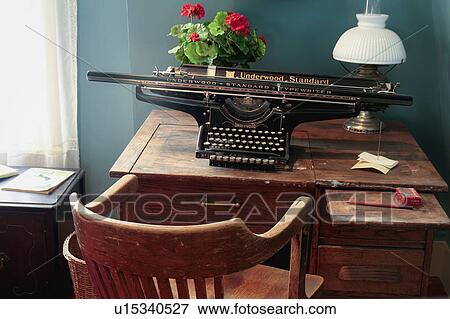 Antique desk and typewriter View Large Photo Image Stock Photo - Antique desk and typewriter. Fotosearch