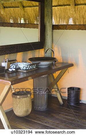 Picture - Bathroom at Mombo Camp in Botswana, Africa. Fotosearch
