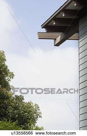 Blue sided house against blue sky View Large Photo Image Stock Photograph - Blue sided house against blue sky. Fotosearch