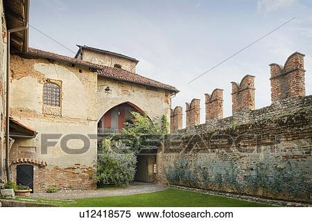 Stock Photography - Brick wall surrounding historic Italian castle. Fotosearch