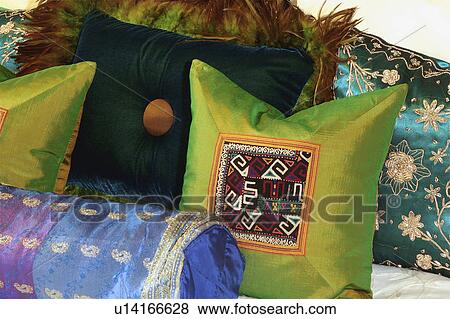 Stock Photo - Brightly colored decorative throw pillows. Fotosearch
