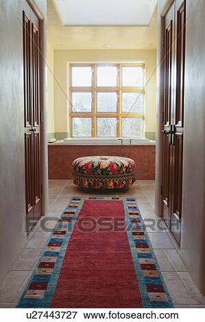 Carpet runner leading down hall into bathroom View Large Photo Image Stock Photo - Carpet runner leading down hall into bathroom. Fotosearch