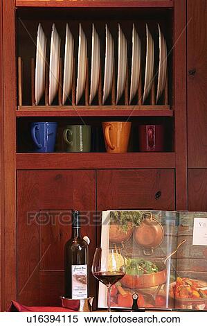 Stock Photography - Detail cabinet and plate stands. Fotosearch