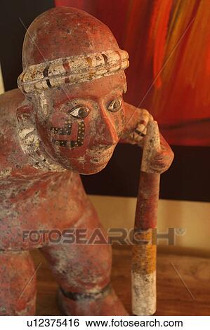 Stock Photograph - Detail indigenous statue. Fotosearch