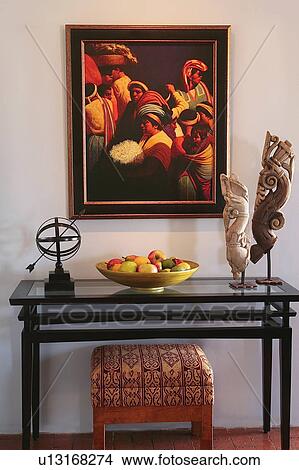 Picture - Fruit bowl and decoration on end table. Fotosearch