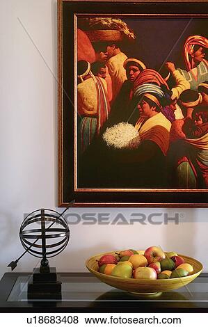 Stock Photo - Fruit bowl and decoration on end table. Fotosearch