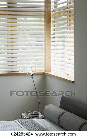 Gray bed in contemporary bedroom View Large Photo Image Picture - Gray bed in contemporary bedroom. Fotosearch