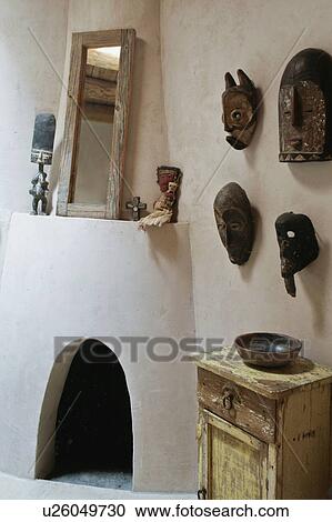 Stock Image - Guest bath with kiva fireplace. Fotosearch