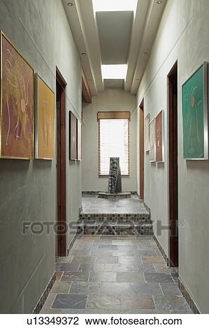 Hallway in eco-friendly home with tile floors and skylights View Large Photo Image Stock Image - Hallway in eco-friendly home with tile floors and skylights. Fotosearch