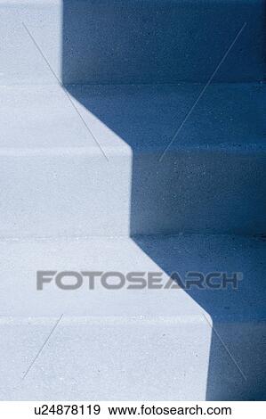 Highlight and shadow on blue staircase View Large Photo Image Stock Photo - Highlight and shadow on blue staircase. Fotosearch