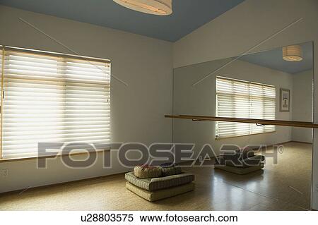Stock Photography - Home yoga studio with mirror. Fotosearch