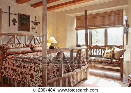Picture - Large bed in southwest style bedroom. Fotosearch