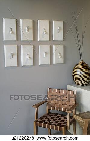 Stock Photo - Large decorative light switches on wall. Fotosearch