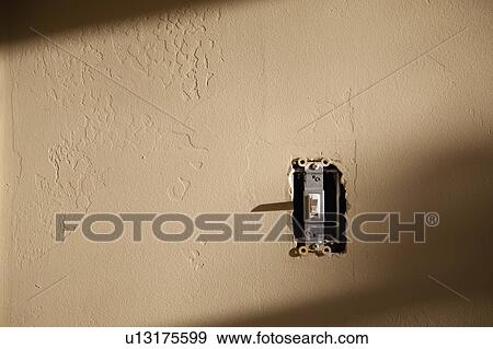 Stock Photo - Light switch without a cover. Fotosearch