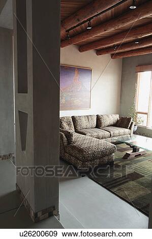 Stock Photo - Living room in green and recycled home. Fotosearch