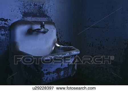 Stock Photo - Old abandoned apron sink. Fotosearch