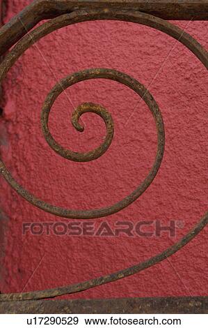 Old iron detail against red wall View Large Photo Image Stock Photo - Old iron detail against red wall. Fotosearch