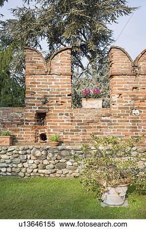 Stock Photography - Old stone and brick wall. Fotosearch