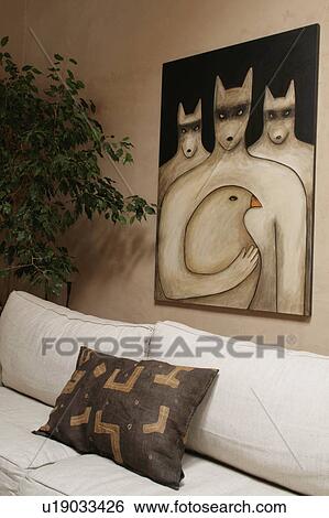 Stock Photograph - Painting above sofa. Fotosearch