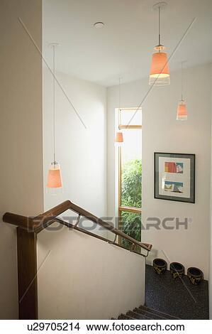 Picture - Pendant lights above staircase. Fotosearch