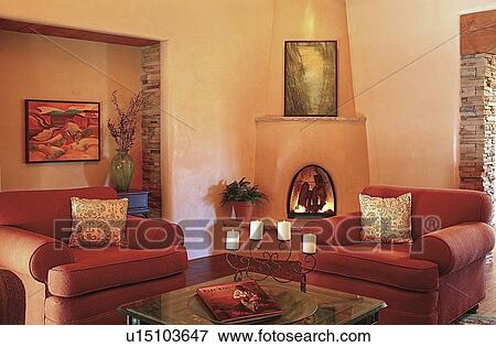 Red armchairs and Kiva in living room View Large Photo Image Stock Photo - Red armchairs and Kiva in living room. Fotosearch