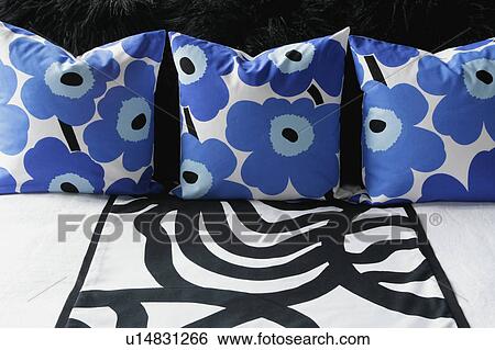 Set of blue floral print pillows View Large Photo Image Stock Photograph - Set of blue floral print pillows. Fotosearch