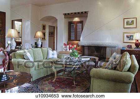 Small sitting area with green sofas View Large Photo Image Stock Image - Small sitting area with green sofas. Fotosearch