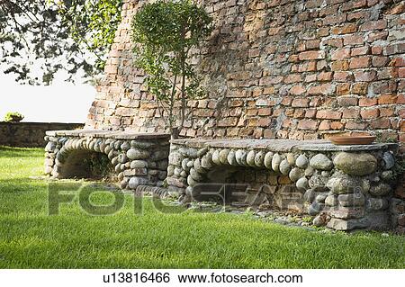 Stone benches along brick castle View Large Photo Image Stock Photograph - Stone benches along brick castle. Fotosearch